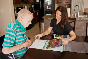 a lady and old man talking